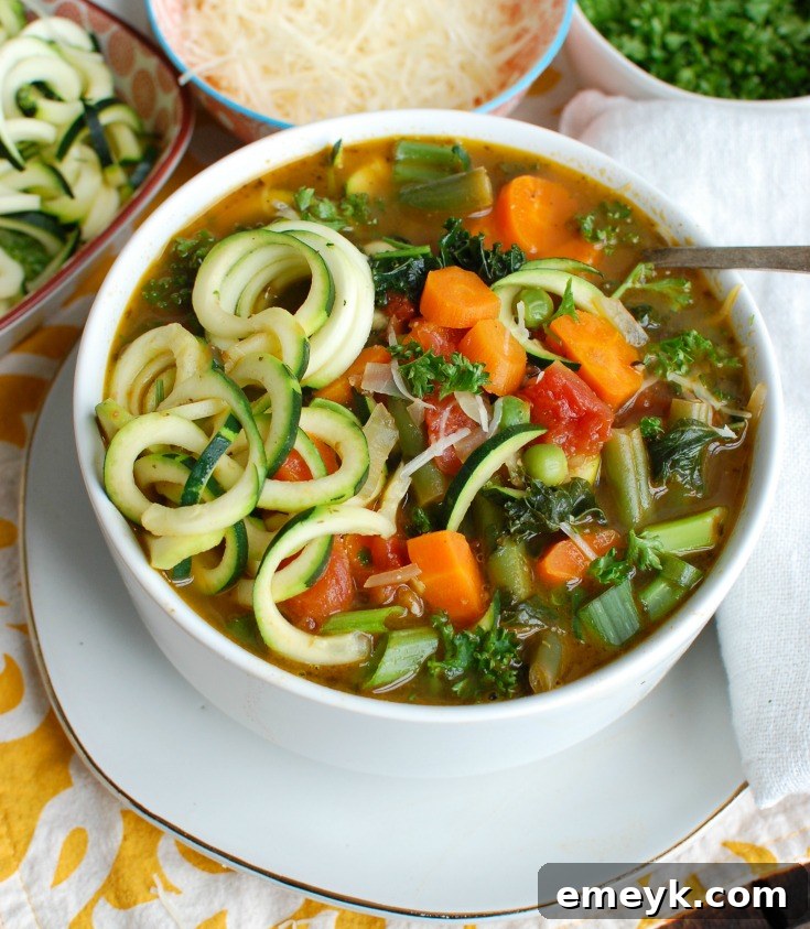Garden Fresh Spring Minestrone 7 A wider shot of the Spring Vegetable Minestrone in a bowl, showing the full portion and garnishes, perfect for a satisfying meal.