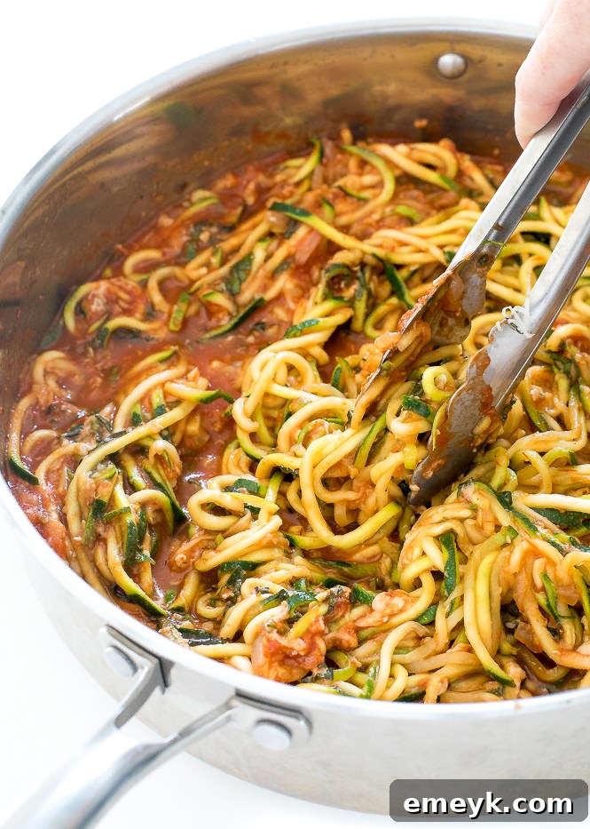 Zucchini Spaghetti with Tomato Sauce, a fresh and healthy Italian-inspired dish.