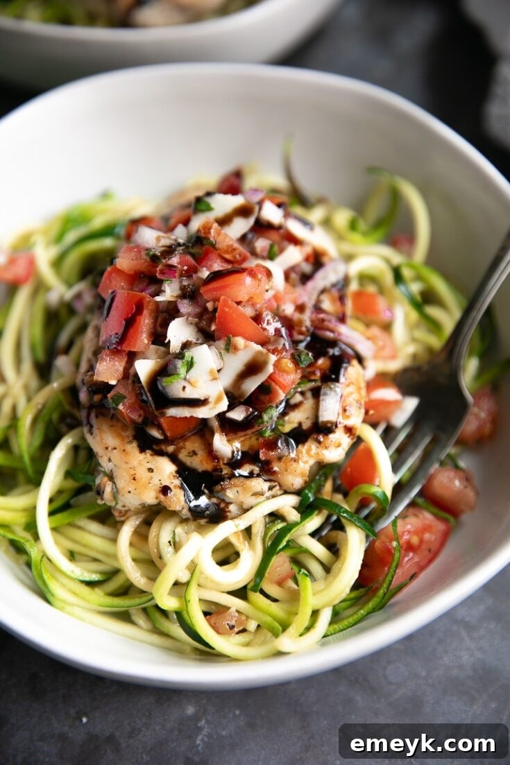 Bruschetta Chicken with Zoodles, a fresh and flavorful Italian-inspired meal.