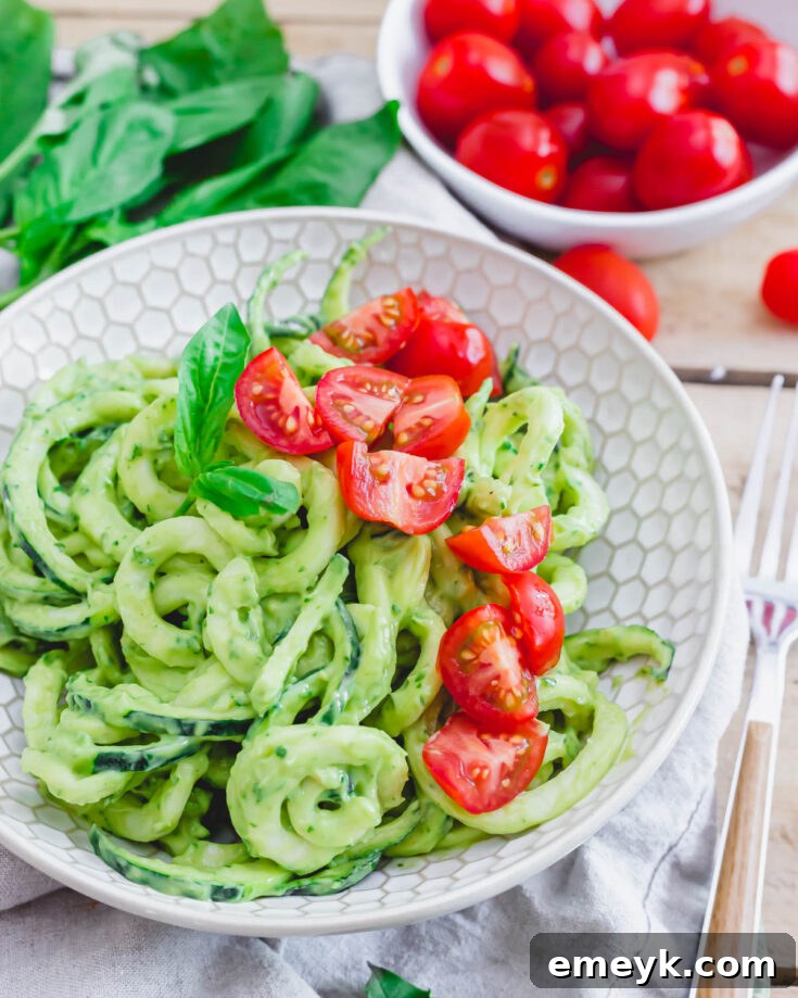 Zucchini Noodles with Creamy Avocado Sauce, a rich and healthy plant-based pasta.