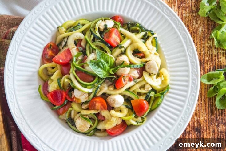 Caprese Zoodle Salad, a fresh and colorful twist on a classic Italian salad.