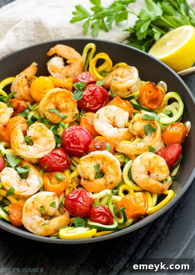 Roasted Tomatoes and Shrimp with Zucchini Noodles, a light and flavorful seafood pasta.