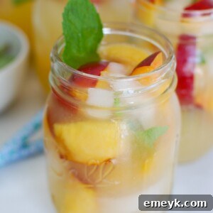 Sparkling Peach Lemonade served in a mason jar
