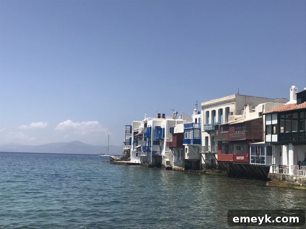 Picturesque view of Little Venice in Mykonos, Greece, with white buildings and colorful accents.