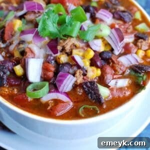 Instant Pot Turkey Chili in a white bowl, ready to serve.