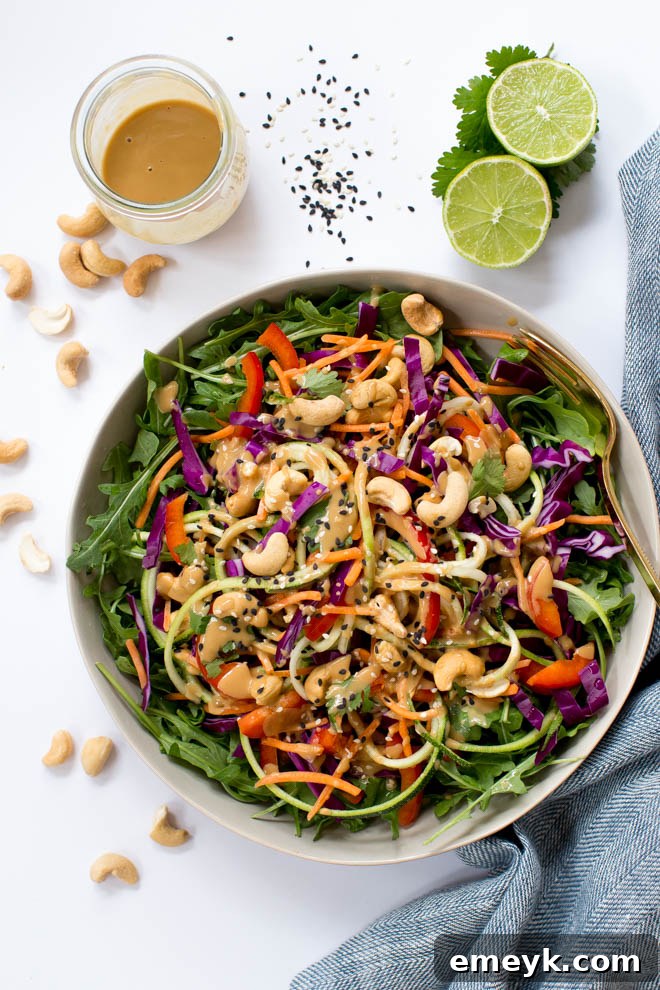 Plant-Powered Plates: 20 Recipes for Peak Energy and Vitality 13 Zucchini Noodle Pad Thai, a vibrant noodle dish with colorful vegetables and peanuts.
