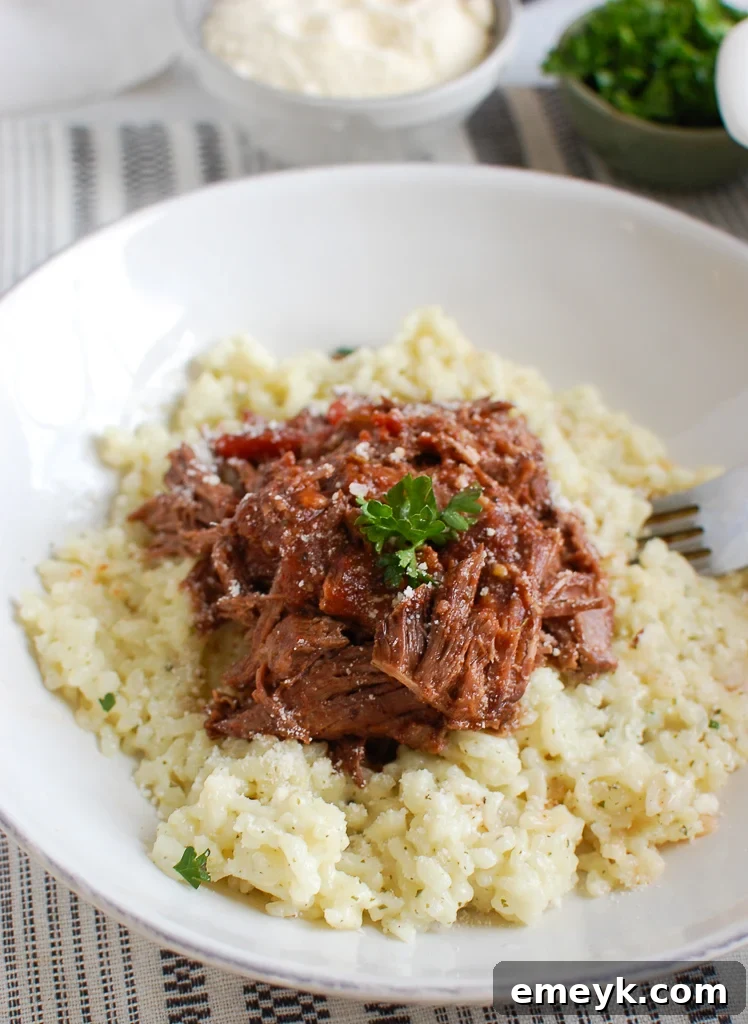 Rich & Savory Italian Slow Cooker Short Ribs 5 Close-up of tender Slow Cooker Italian Short Ribs in a white bowl.