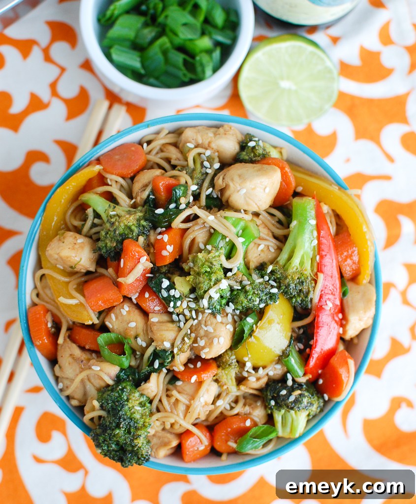 Close-up of Easy Chicken Ramen Noodle Stir Fry in a blue bowl