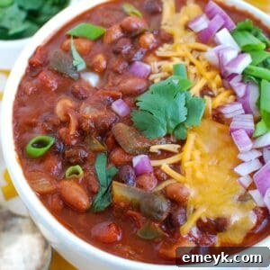 Slow Cooker Vegetarian Chili with fresh garnishes, ready to be served
