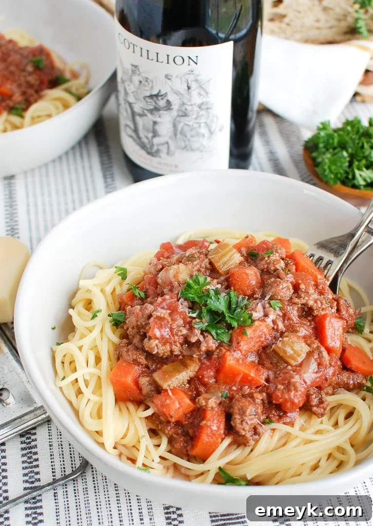 Slow Cooker Spaghetti Sauce with Wine simmering in a pot