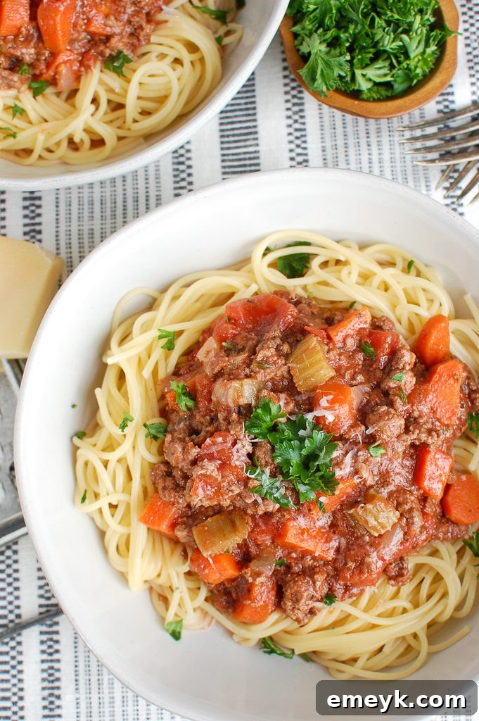 Slow Cooker Spaghetti Sauce in a bowl with a fork