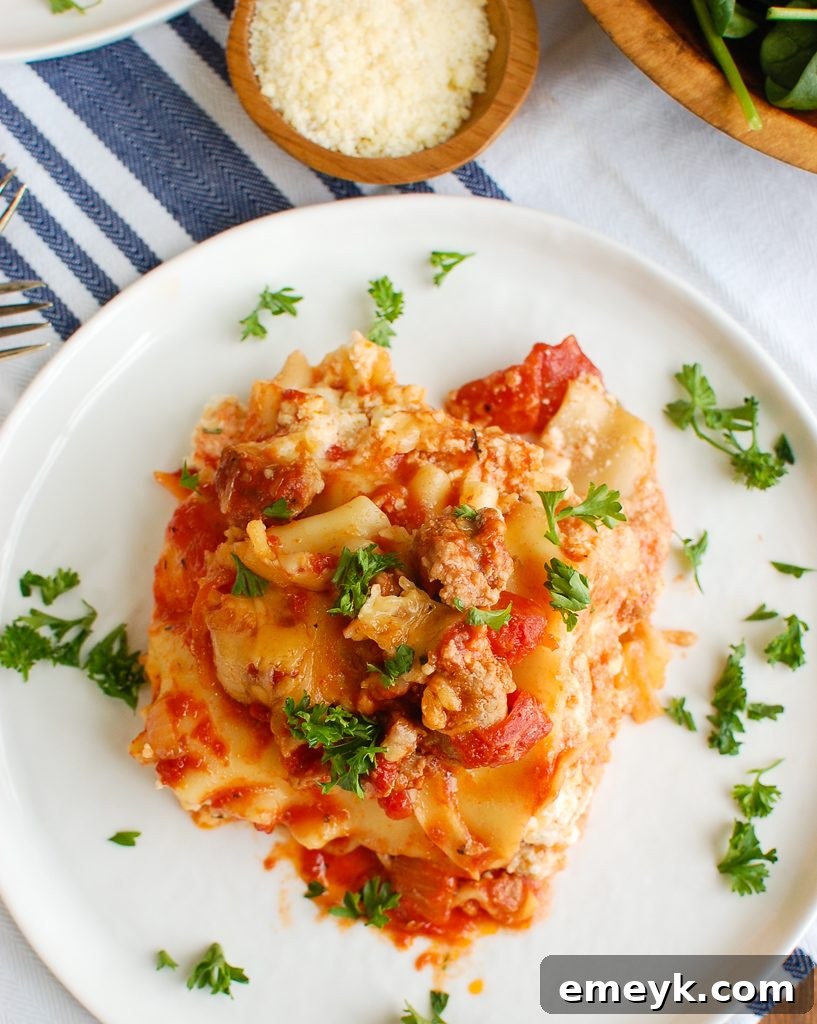Layers of Slow Cooker Lasagna assembled in the crockpot before cooking.