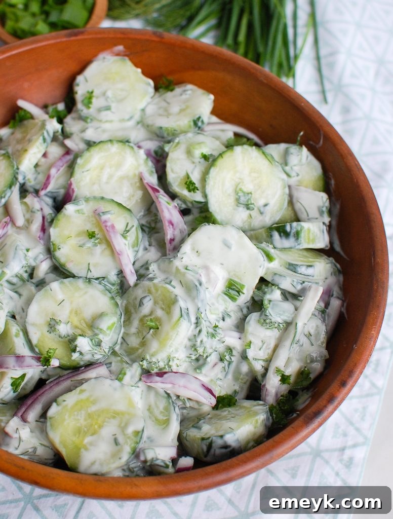 Creamy Cucumber Salad in a Big Wooden Bowl