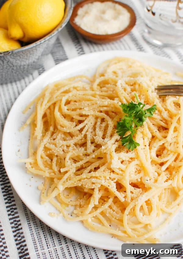 Zesty Lemon Pasta Delight 4 Close-up of Lemon Pasta with a fork, ready to be eaten