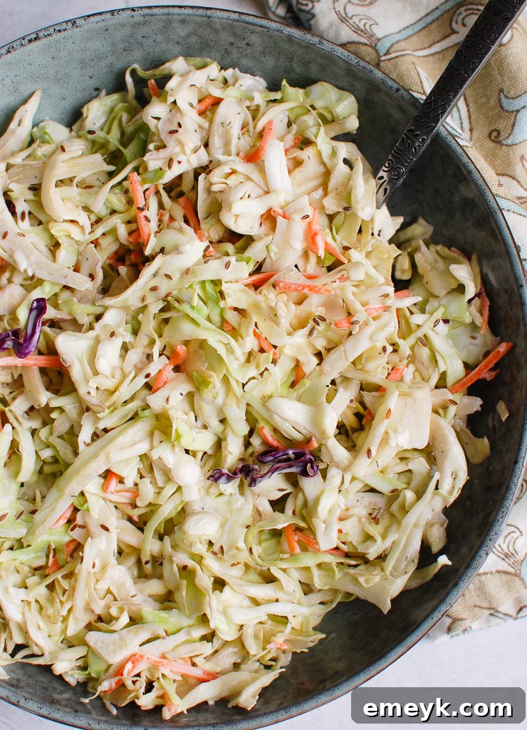 Creamy Coleslaw Recipe in a beautiful white bowl, ready to serve