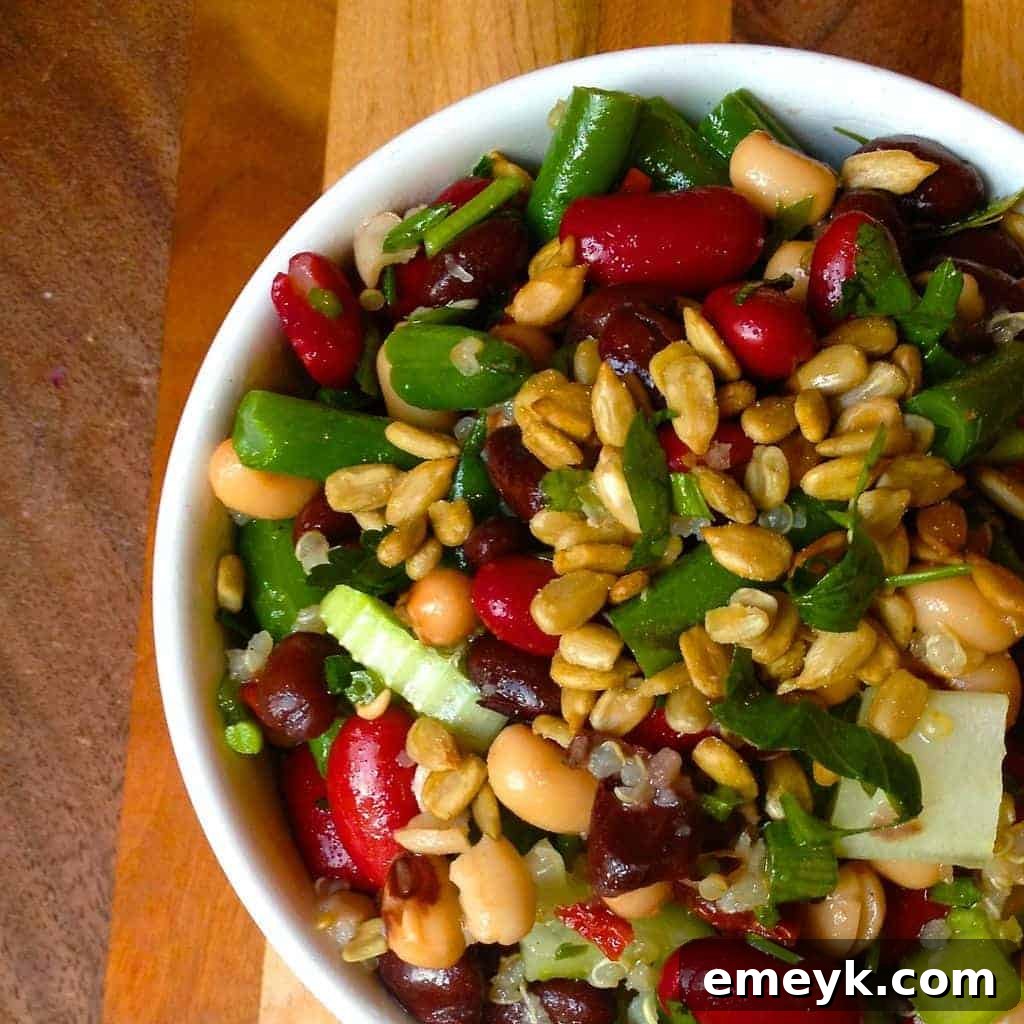 Four Bean Salad with Quinoa, Sun-Dried Tomatoes, and Sunflower Seeds for a textural feast