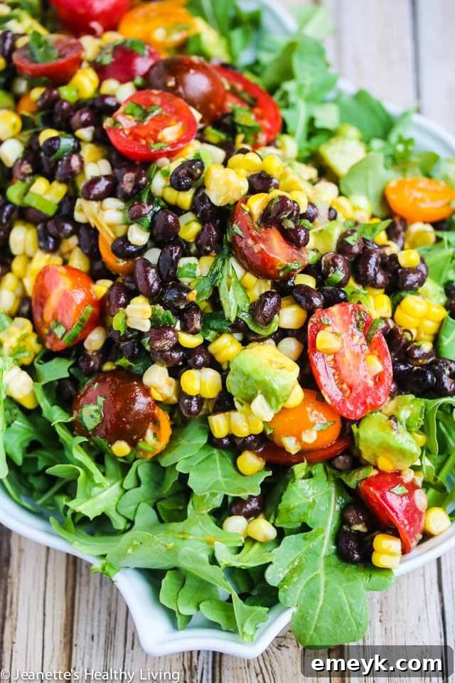 Chipotle Black Bean Tomato Corn Avocado Salad, a vibrant dish for summer entertaining
