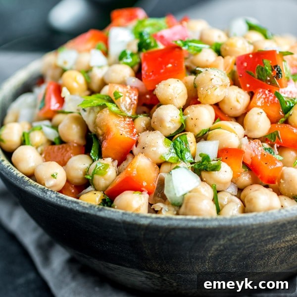 Traditional Portuguese Chickpea Salad (Salada de Grao de Bico) with bell peppers, onions, and garlic
