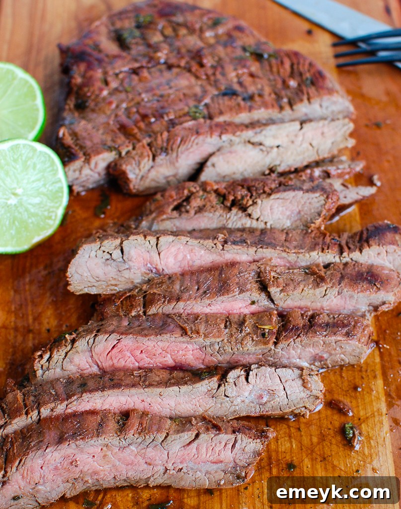 Fire-Kissed Carne Asada 2 Grilled Carne Asada on cutting board with knife