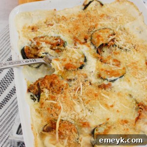 Zucchini Gratin in white casserole dish