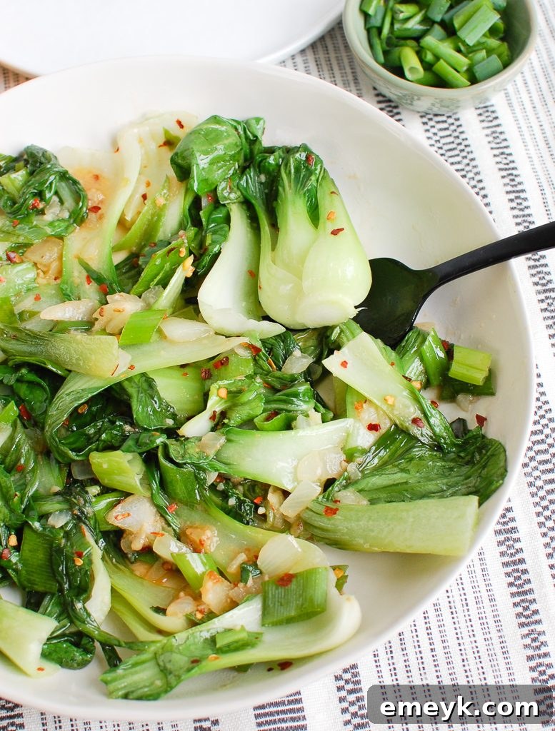 Effortless Bok Choy Perfection 2 Easy Bok Choy Recipe in white bowl with sesame seeds