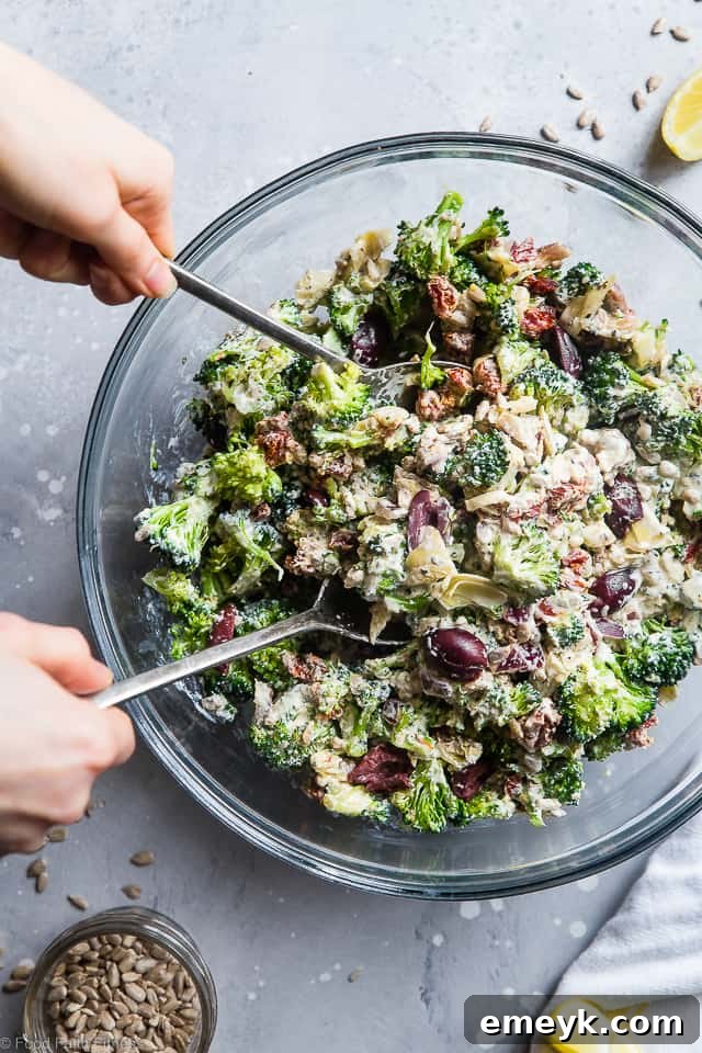Mediterranean Low Carb Broccoli Salad with crunchy broccoli florets, olives, bell peppers, and a creamy, light dressing.