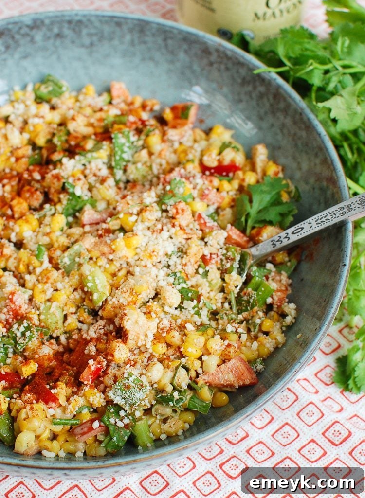 Mexican Corn Salad garnished with fresh cilantro in a bowl