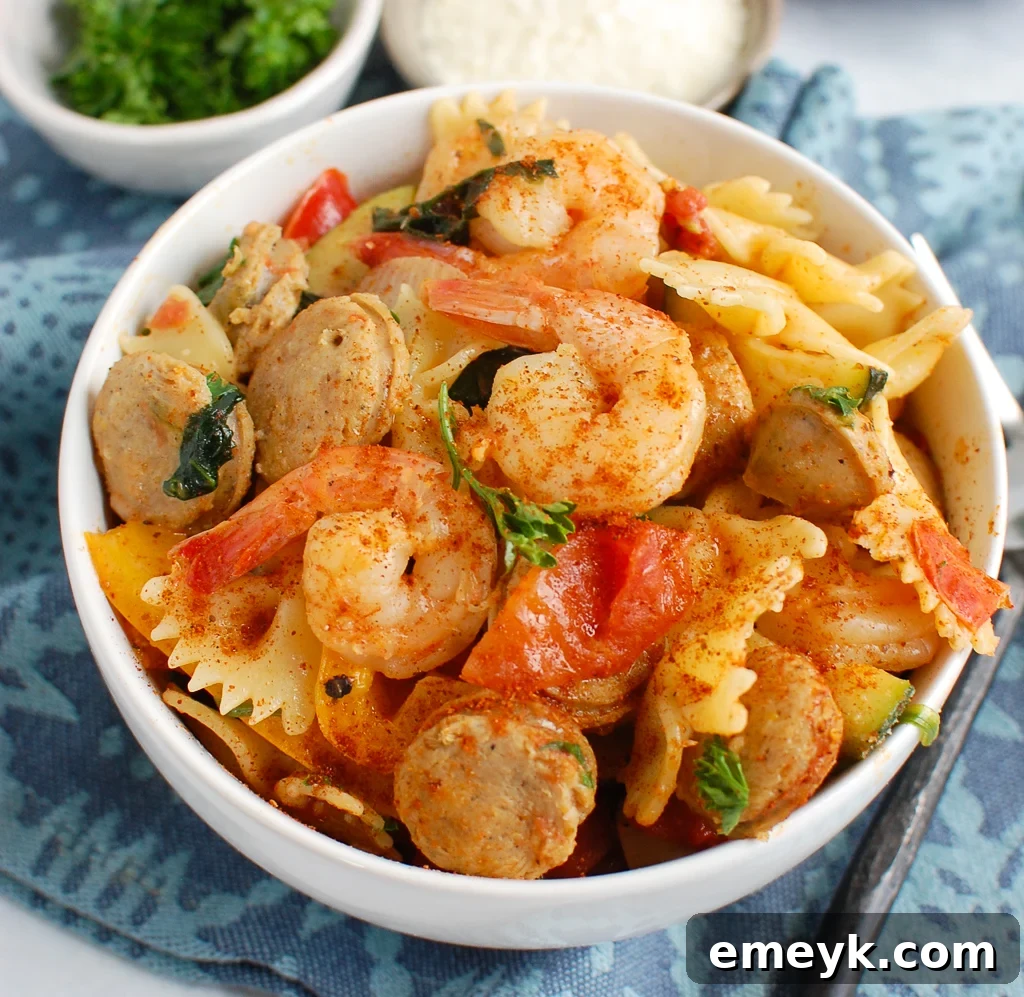 Bayou Blast Pasta with Chicken Sausage and Shrimp 6 Large bowl of Cajun Pasta with Chicken Sausage and Shrimp, ready to be served family-style.