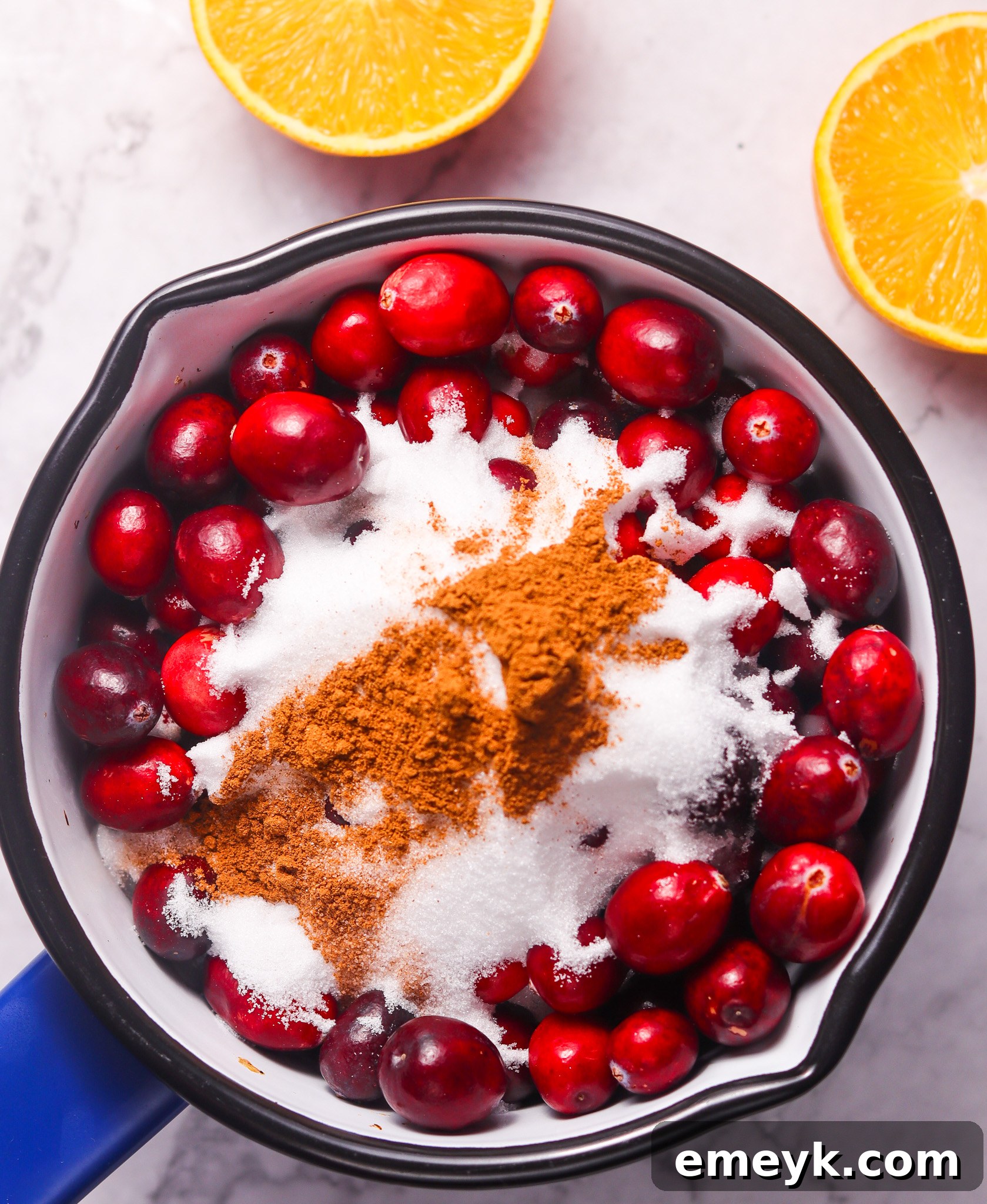 Ingredients for Homemade Cranberry Sauce in a bowl before cooking.