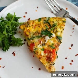 Moroccan Frittata, a delicious baked egg dish with vegetables, harissa, and feta, ready to serve.