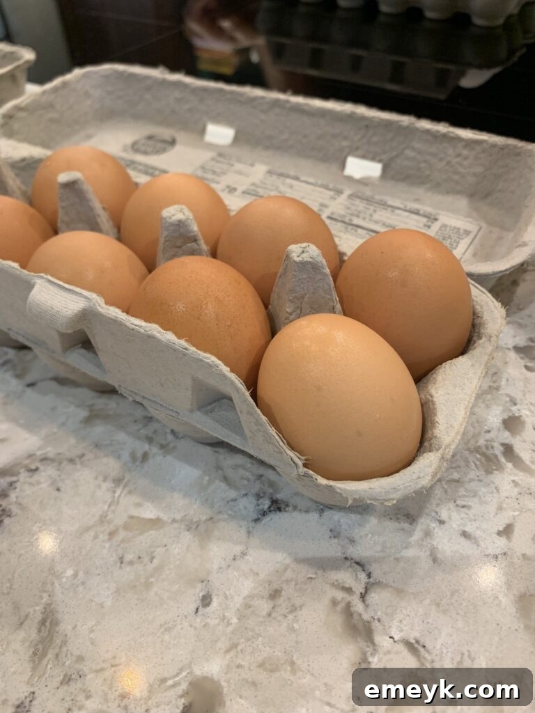 Fresh eggs in a carton, ready to be used in a delicious casserole.