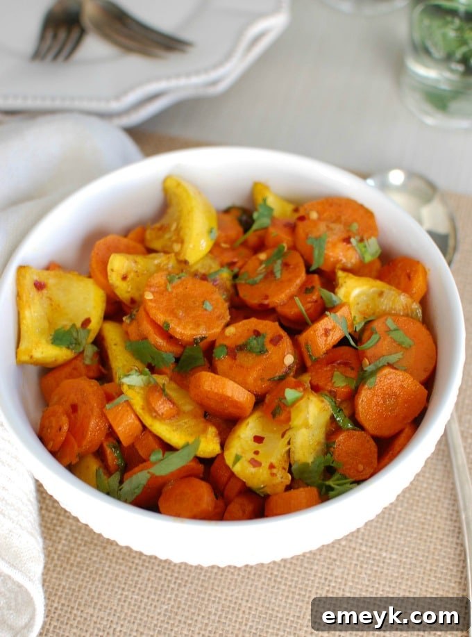 Moroccan Roasted Carrots, seasoned with aromatic spices and garnished with cilantro.