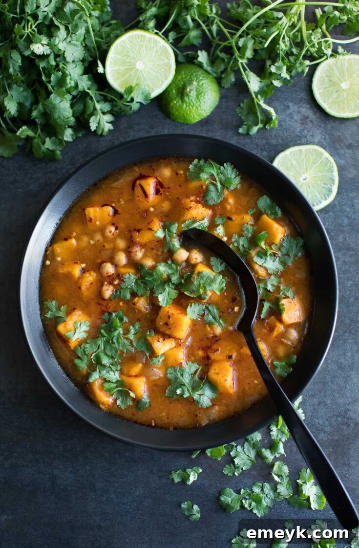 Spicy Moroccan Sweet Potato Soup with chickpeas and vegetables.