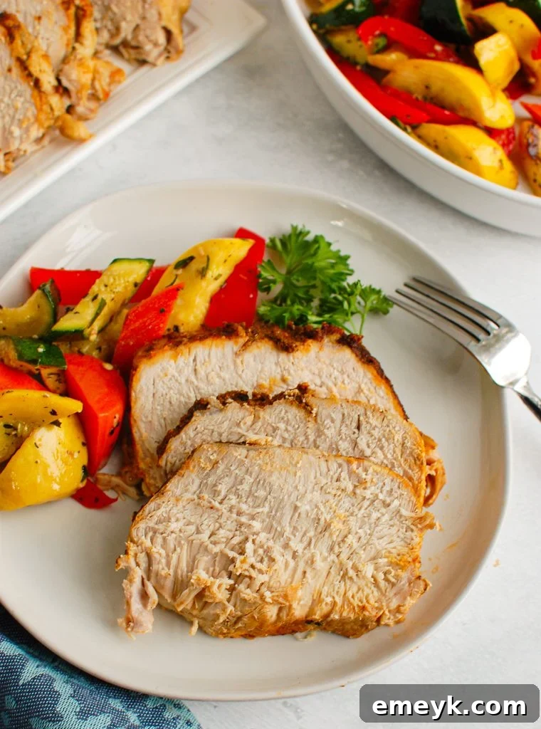 How to Cook Pork Loin in the Slow Cooker on white plate