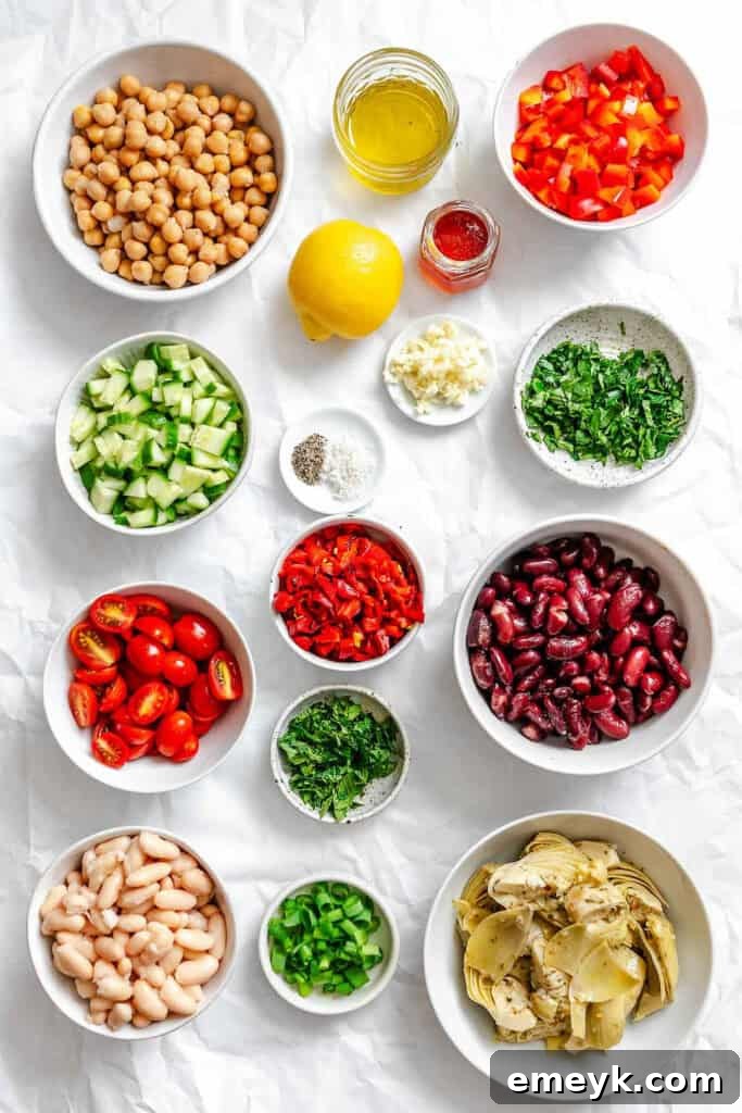 Fresh ingredients laid out for Mediterranean Three Bean Salad recipe