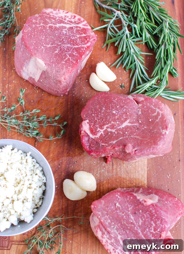 Juicy Beef Tenderloin Steaks with Creamy Blue Cheese Sauce, beautifully plated and ready to serve.