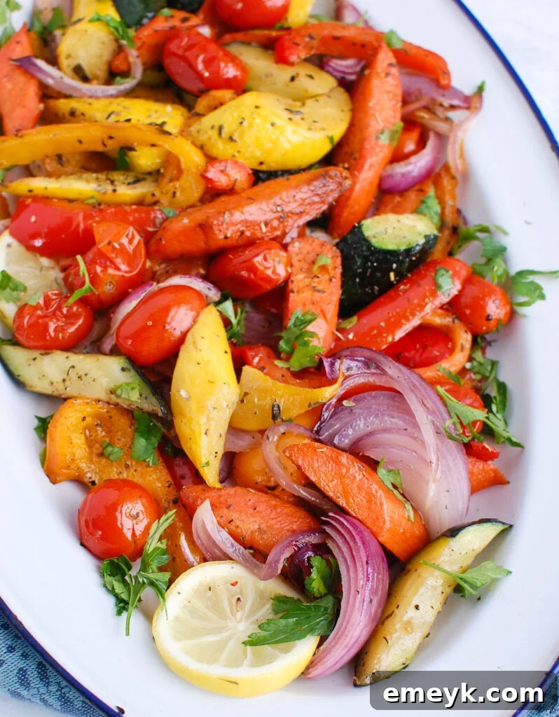 Mediterranean Roasted Vegetables in white platter, showcasing a vibrant mix of colors