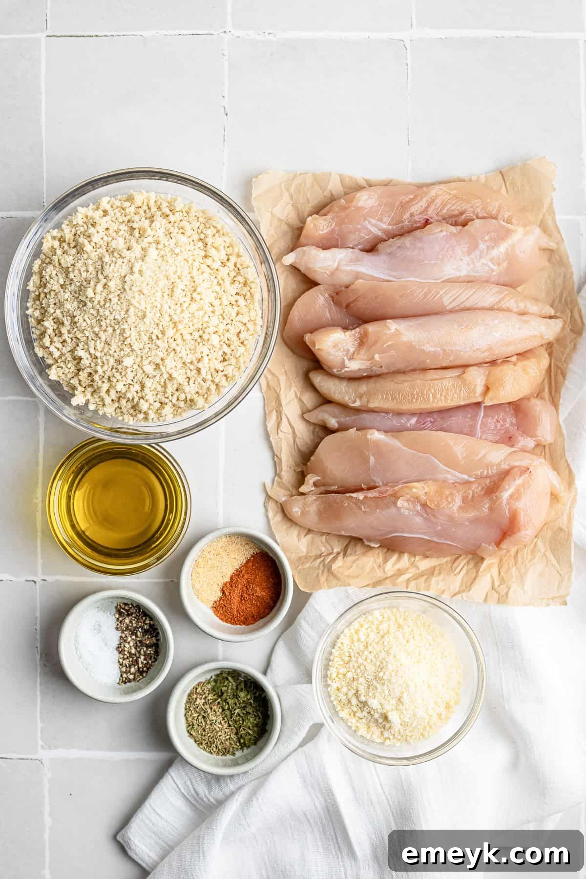 Perfectly Crispy Baked Chicken Tenders 3 Ingredients for baked chicken tenders: chicken, panko, parmesan, and seasonings.
