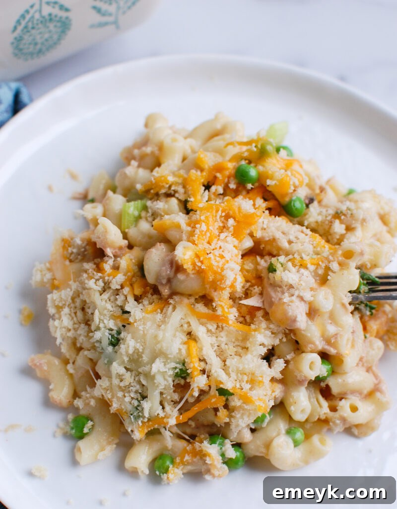 Easy Tuna Noodle Casserole on white plate, ready to be served