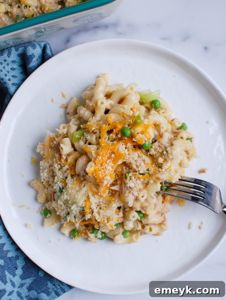 Easy Tuna Noodle Casserole with fork taking a bite