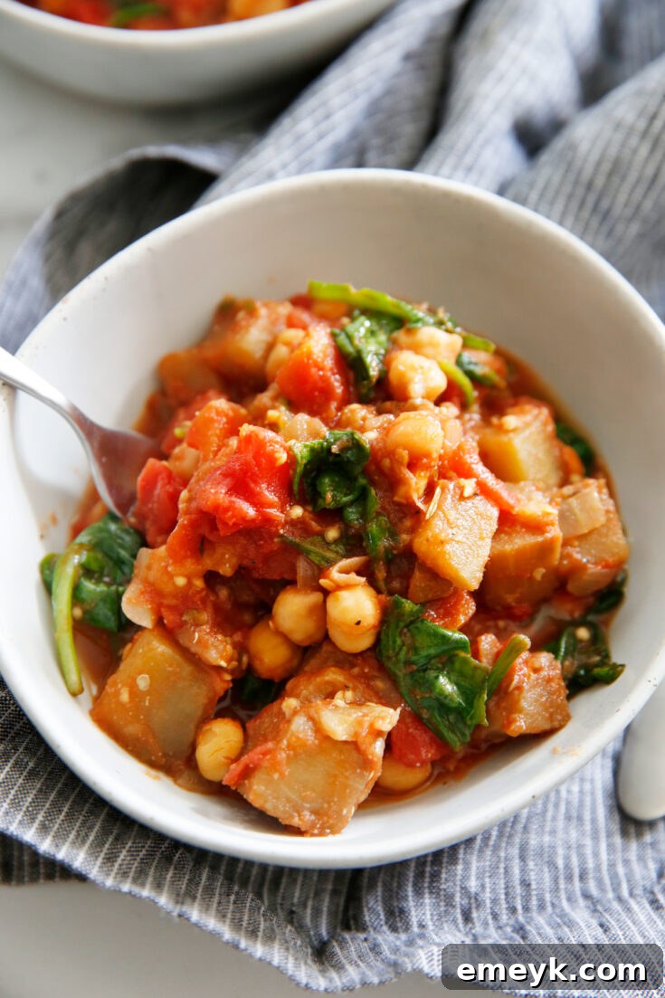 Hearty Tomato, Eggplant, and Chickpea Stew in a bowl
