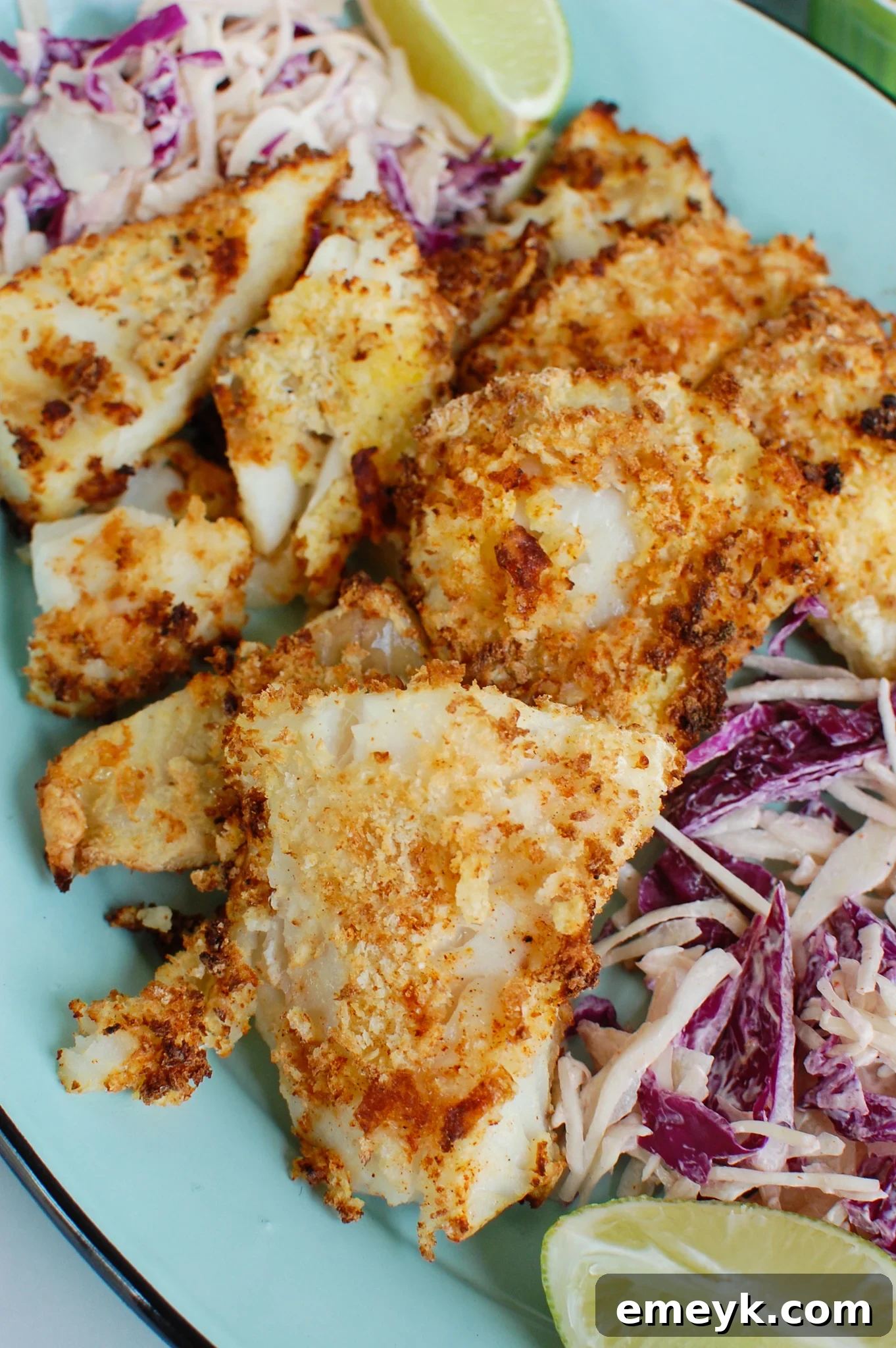 Air Fryer Cod on blue plate, ready for tacos