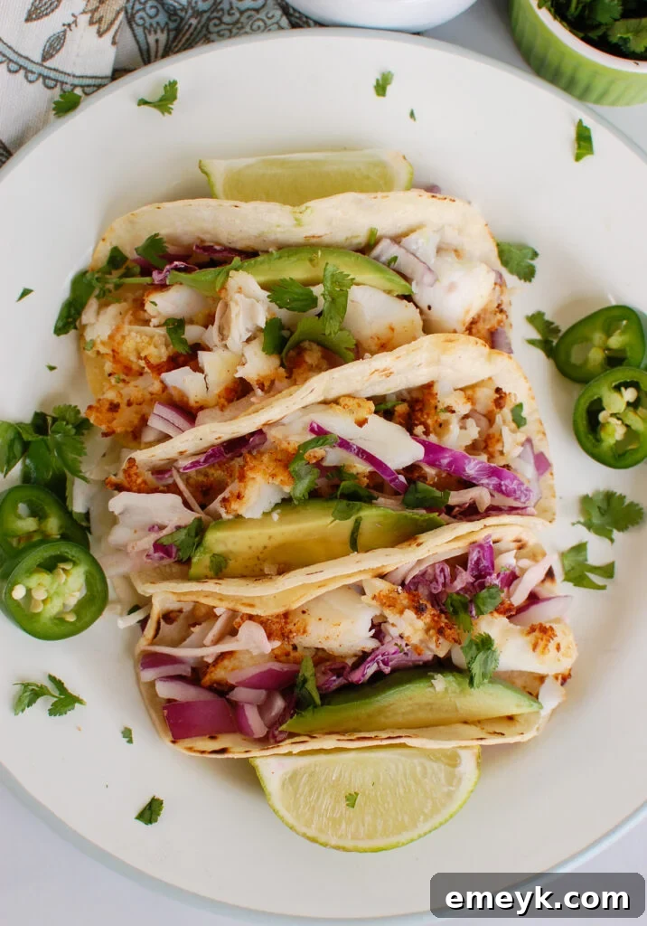 Easy Cod Fish Tacos topped with fresh cilantro