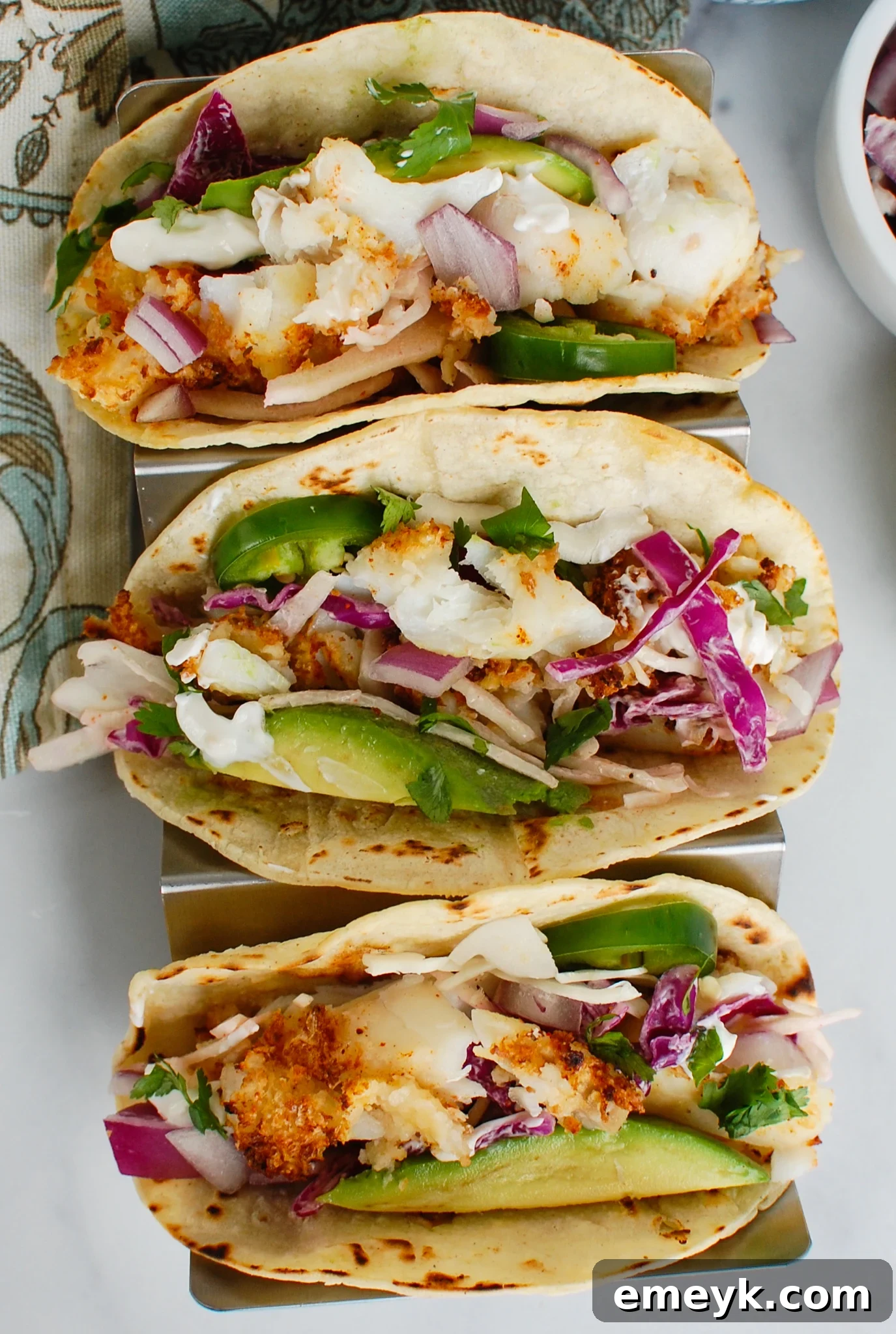 Crispy Air Fryer Cod served in tacos with fresh toppings