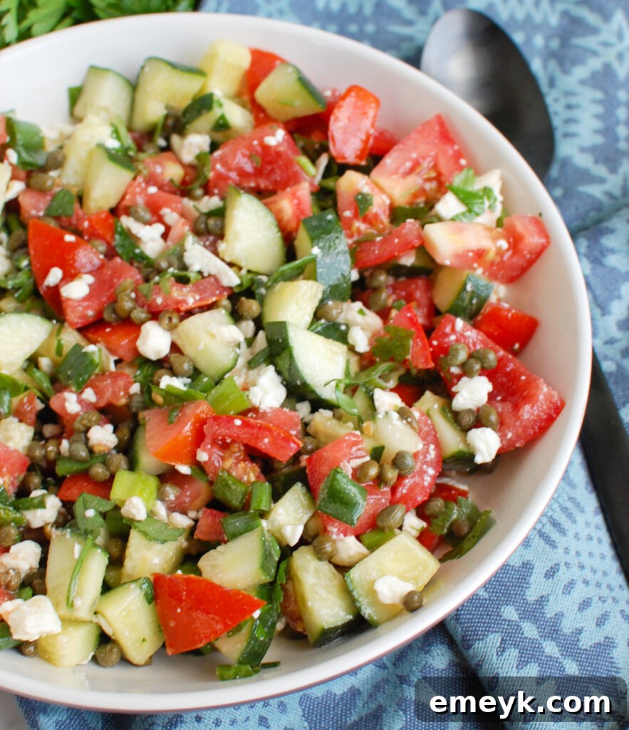 Cucumber Salad with Capers, close-up with crumbled feta cheese