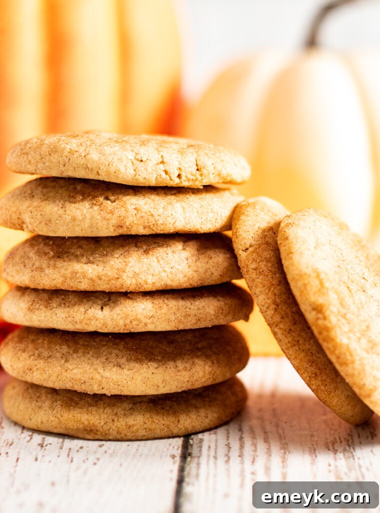 Stack of fluffy Pumpkin Snickerdoodles, showcasing their soft texture and cinnamon sugar coating