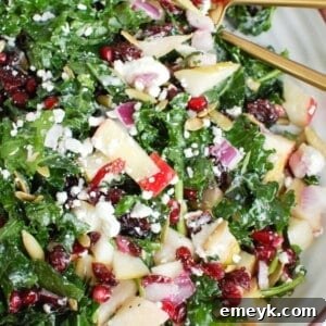 Easy Fall Salad on a white platter with gold spoon