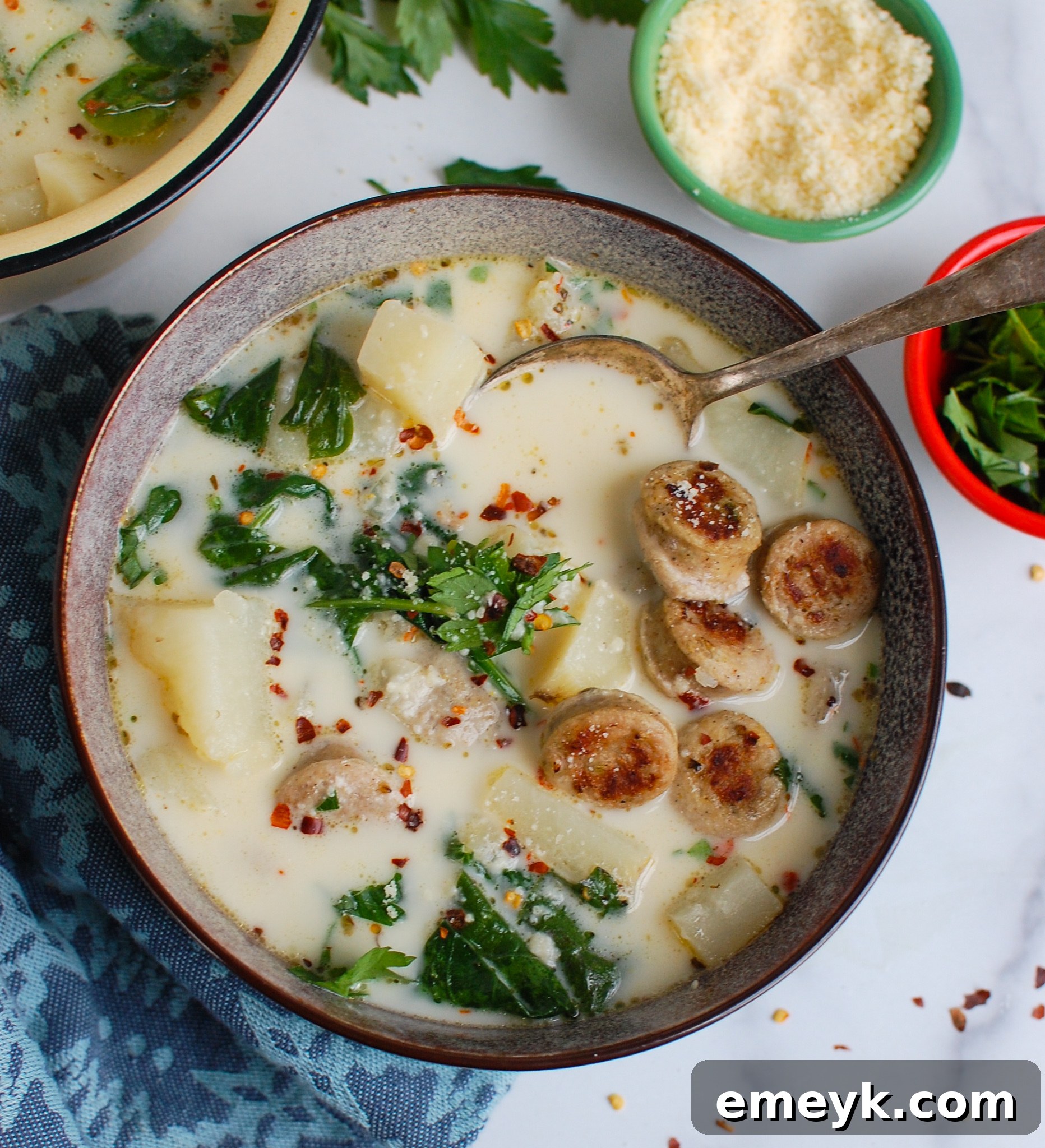 Hearty Slow Cooker Zuppa Toscana 4 Slow Cooker Zuppa Toscana garnished with fresh parsley.