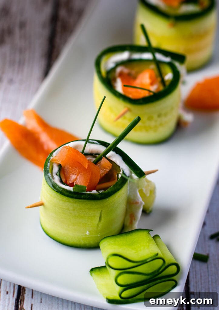 Smoked Salmon Cucumber Appetizer Bites on white platter