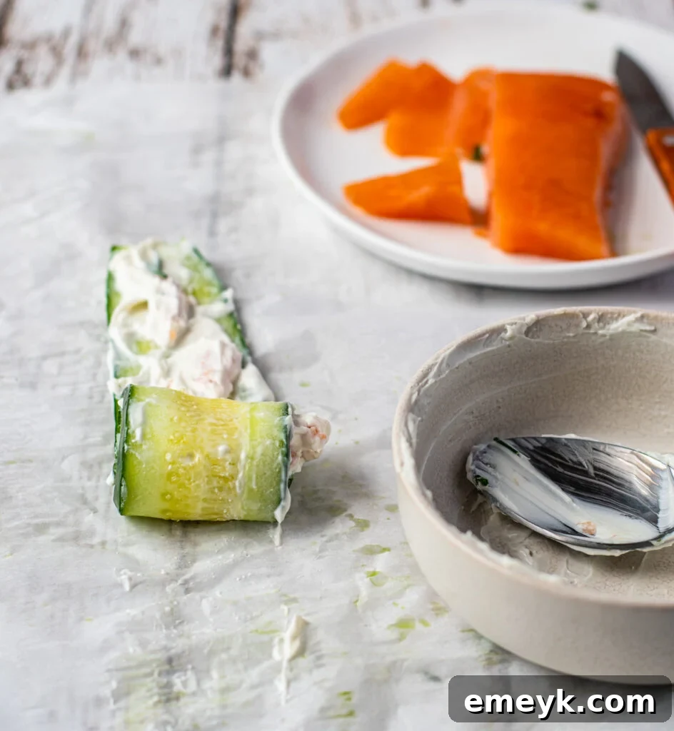 Smoked Salmon Cucumber Appetizer Bites rolled up and secured with toothpicks